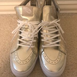 Gold metallic cut out high top Vans